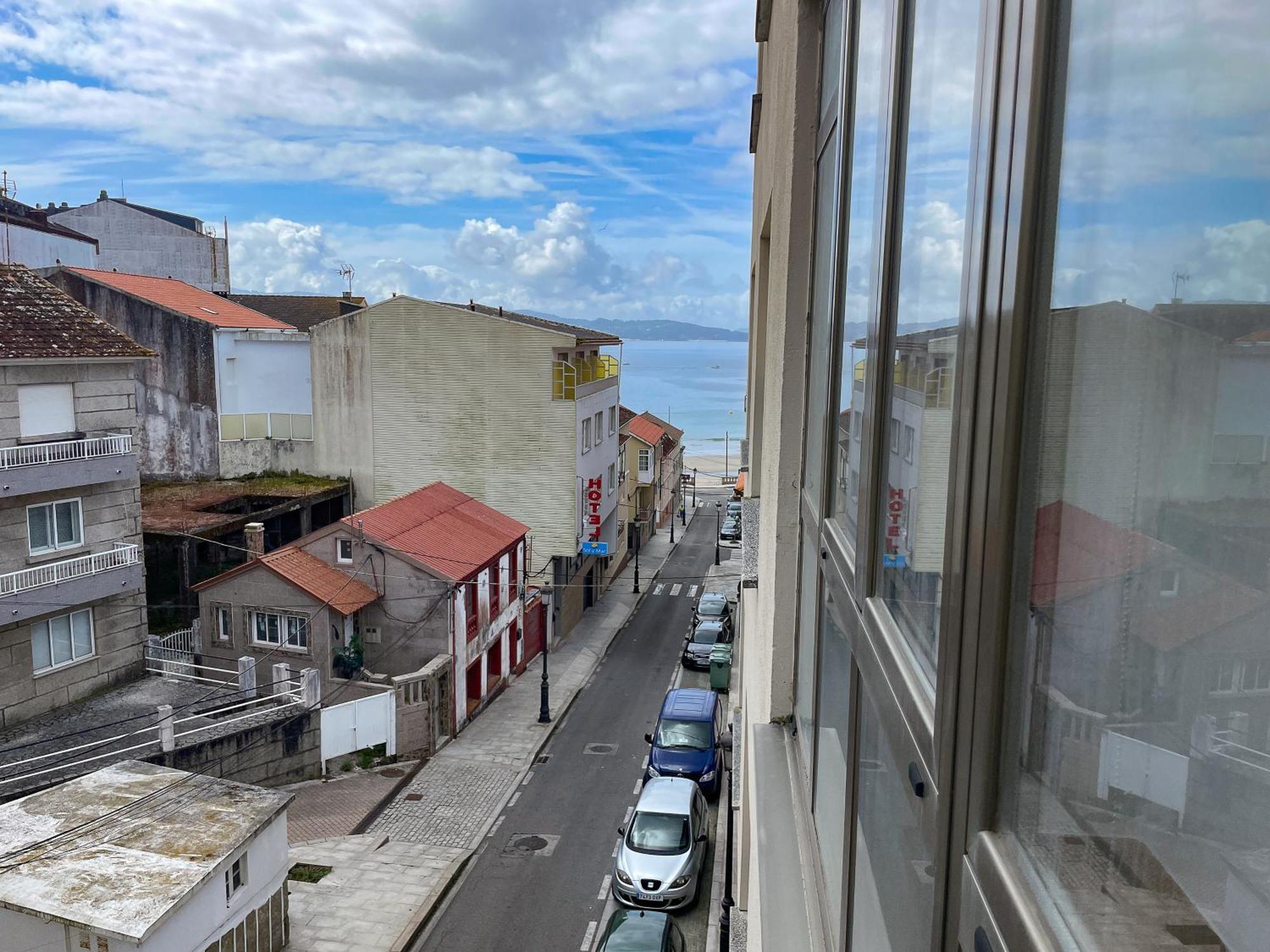 Apartamentos Portonovo Playa 3000 Bagian luar foto