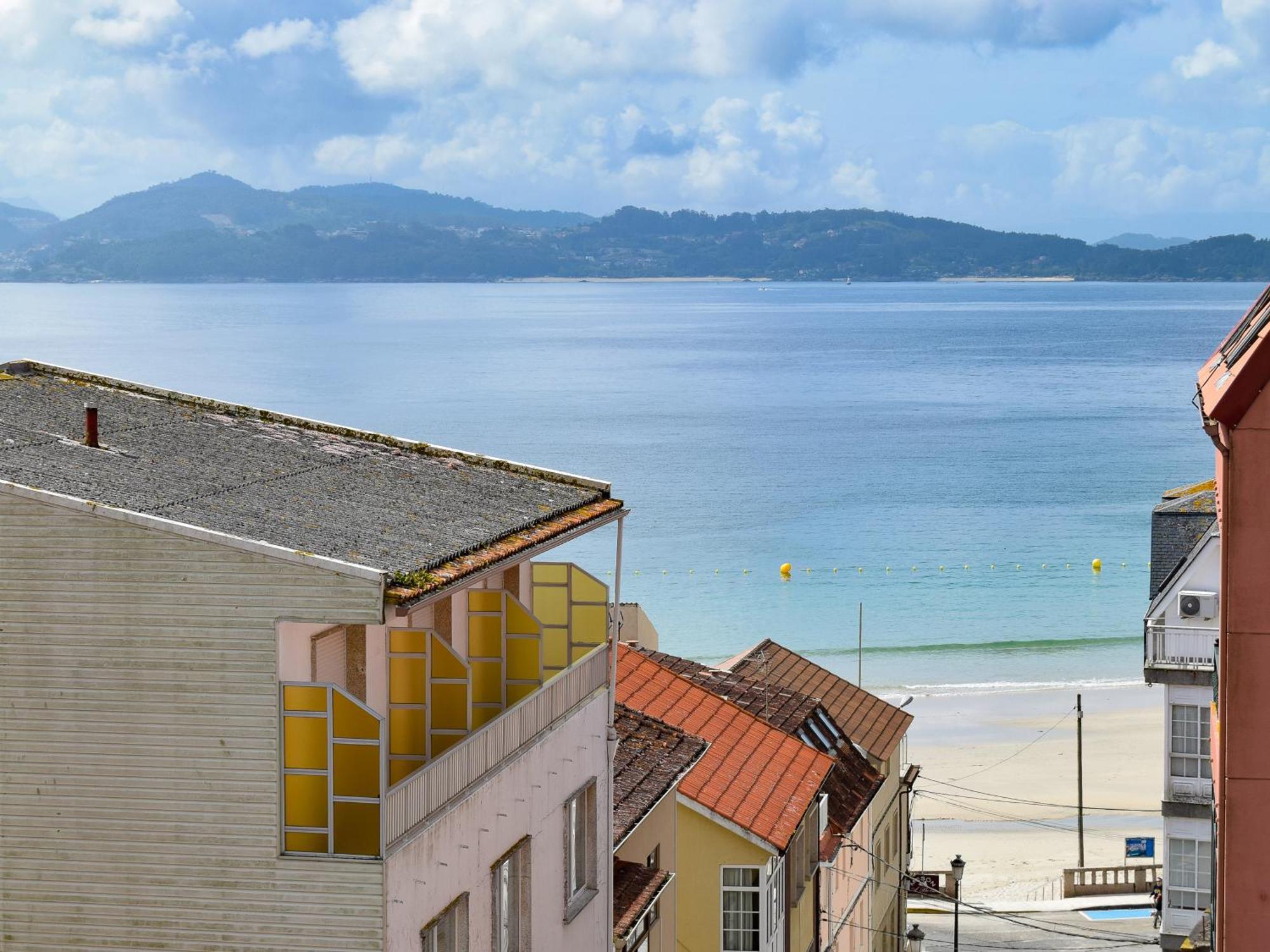 Apartamentos Portonovo Playa 3000 Bagian luar foto